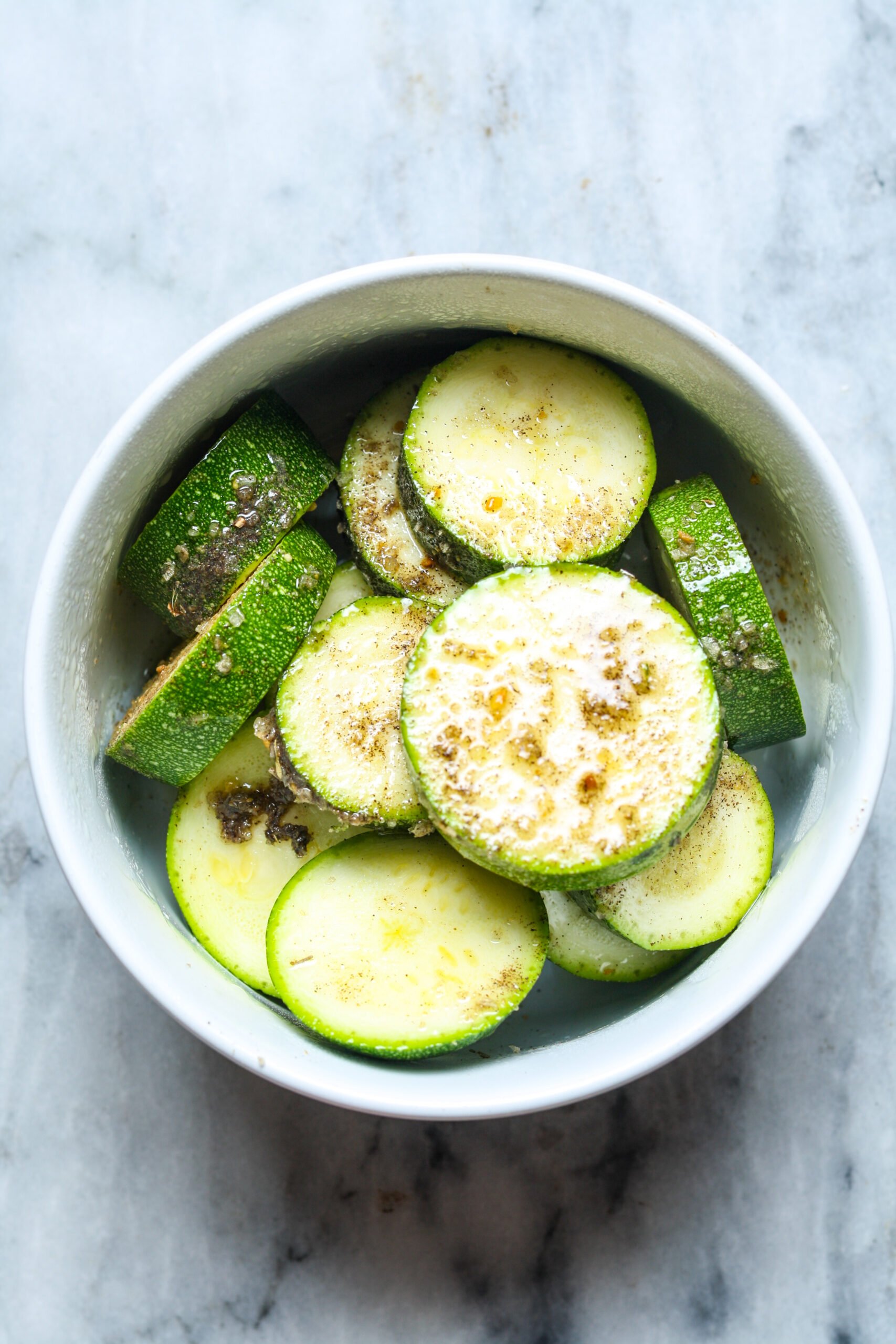 Seasoned zucchini rounds.