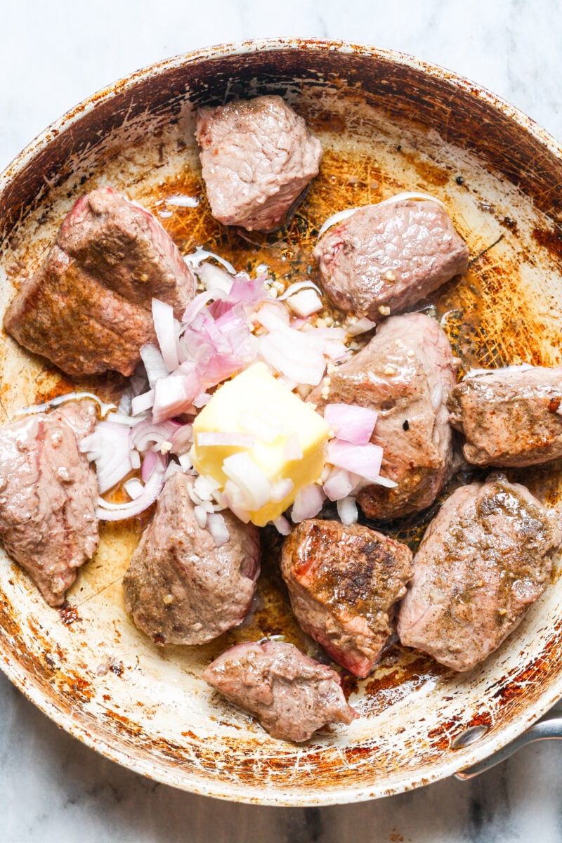 Butter and shallots with meat.